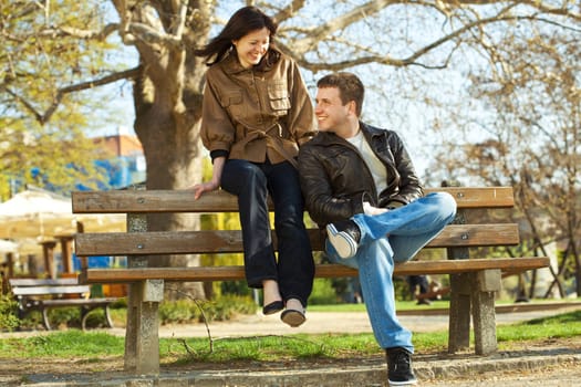 love couple sitting on a bench