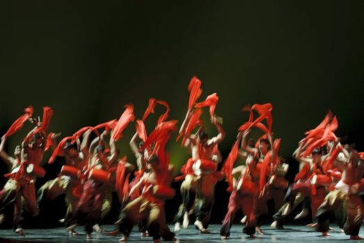 blurred jumping of chinese national dancers