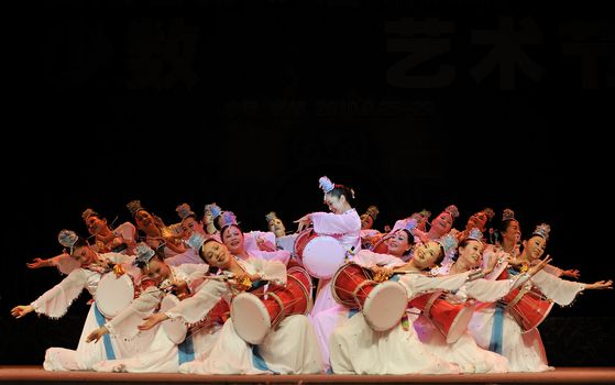 CHENGDU - SEP 28: Korean ethnic dancers perform on stage in the 6th Sichuan minority nationality culture festival at JINJIANG theater.Sep 28,2010 in Chengdu, China.