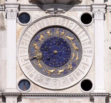 The astronomical clock of St. Mark's square in Venice, Italy.  The clock shows the location of the moon and corresponding astrological symbols.