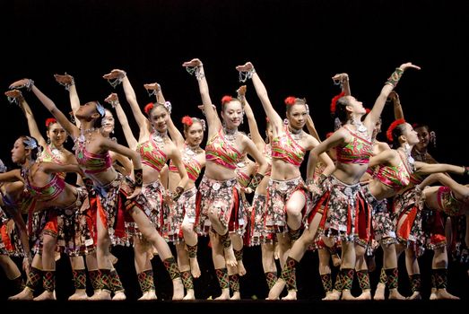 CHENGDU - DEC 12: Group dance show "Songs waft between landscape" performed by Guangxi Institute of Arts dance troupe at JINCHENG theater in the 7th national dance competition of china on Dec 12,2007 in Chengdu, China.