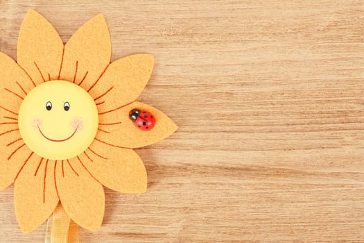 wooden board for spring message with two red hearts and flowers
