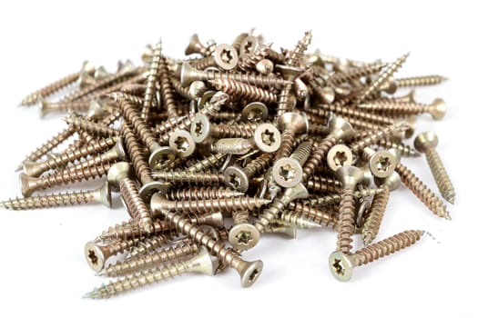 Closeup pile of screw for wood on white background