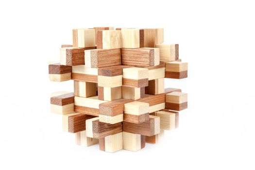 solved wooden puzzle isolated on white background
