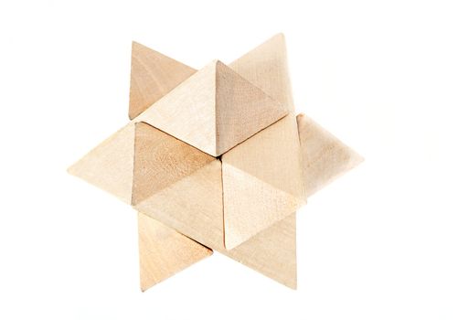 solved wooden puzzle isolated on white background