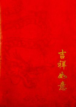 Chinese dragon with text on old red paper background 