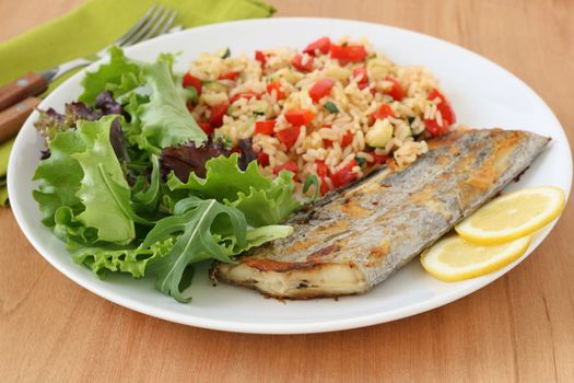 fried swordfish with rice and vegetables