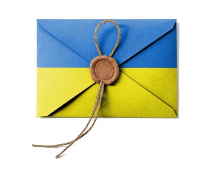 The Ukrainian flag on the mail envelope. Isolated on white.