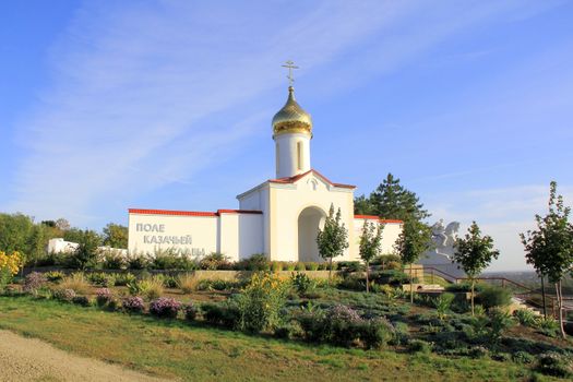 Picture with monument of cossack village in Russia