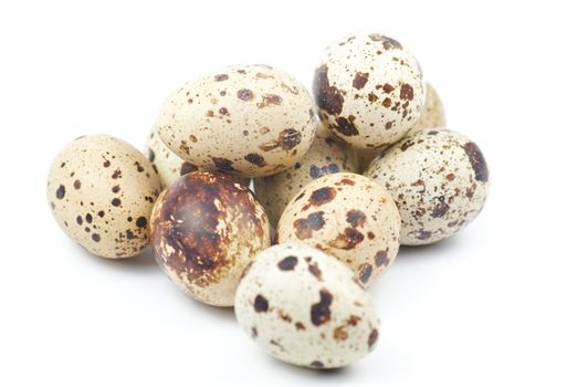 Quail eggs isolated on white background