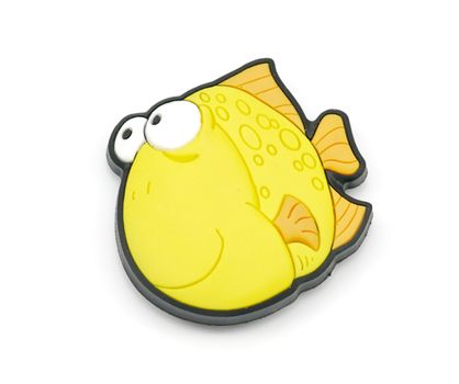 Yellow small fish-magnet isolated on white background