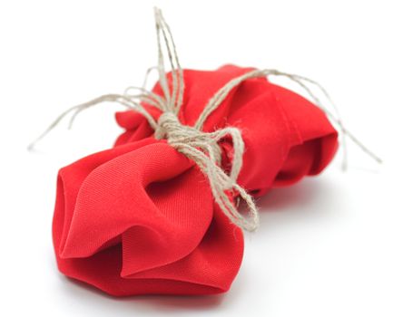 Valentine bow with cord threads isolated on white background