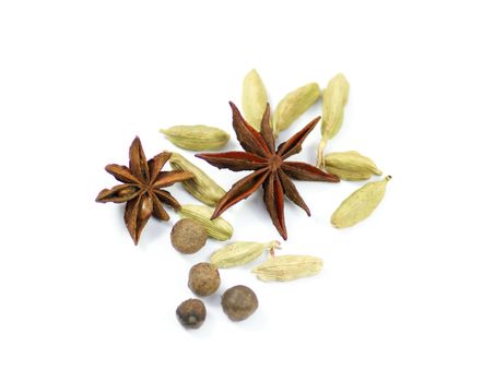 Anise, carnation and pepper isolated on white background