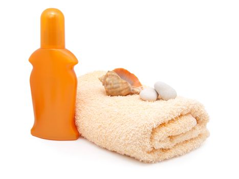 bath towel with plastic bottle (sunscreen). Isolated on white.