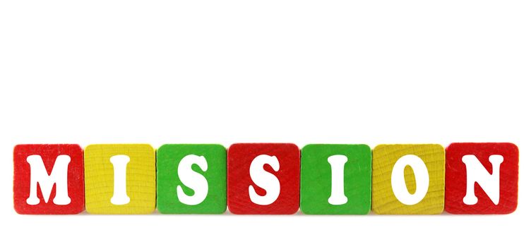 mission - isolated text in wooden building blocks