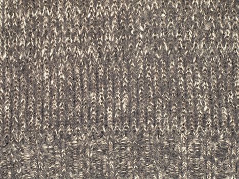 The sheep wool fabric texture pattern as background.