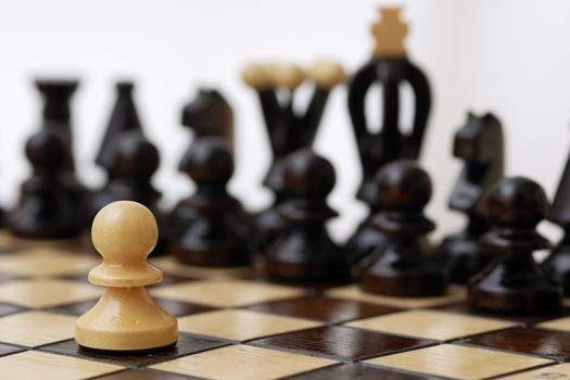 One pawn standing up to a stronger opponent.