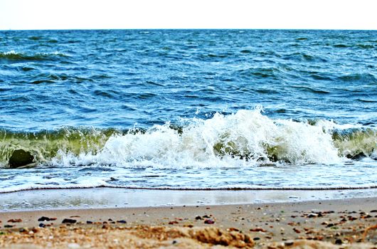 Sand beach and sea surf. 