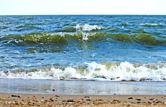 Sand beach and sea surf. 
