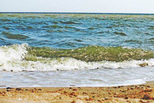 Sand beach and sea surf. 
