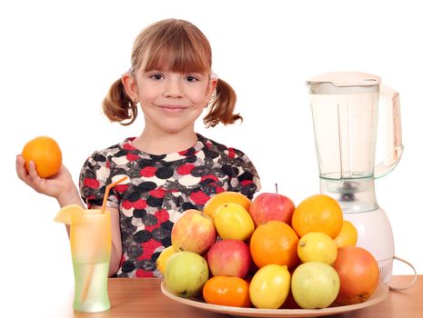 beautiful little girl make fruit juice