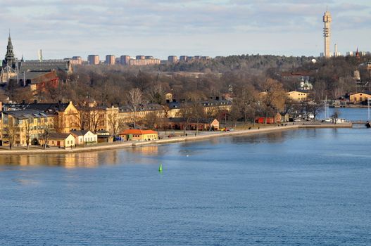 View over the small Island Skeppsholmen in Stockholm with the tower of Kaknäs in the background.