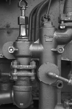 Detail image of piping on a steam locomotive.