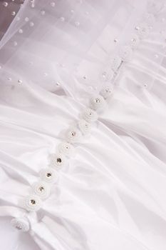 white wedding dress with buttons
