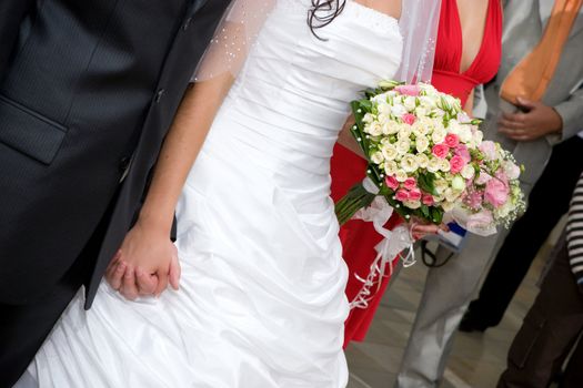 bride, dress and flower bouquet