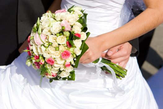 bride, dress and flower bouquet