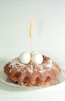 Easter cake with eggs and spike on the plate