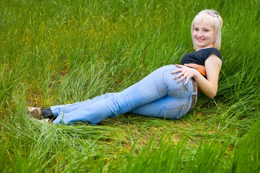 blond beauty on the grass
