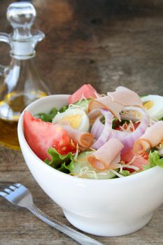 Beautiful salad with all the fixings and turkey to top it off.