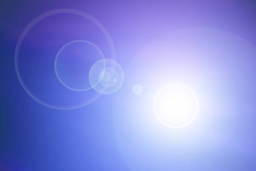 Blue background with lens flare