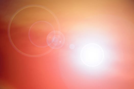 Orange background with lens flare