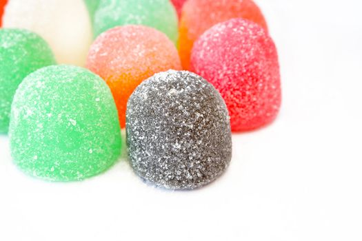 Close up of gumdrops on a white background with copy space.