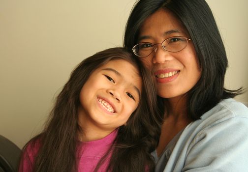 Asian mother and daughter .