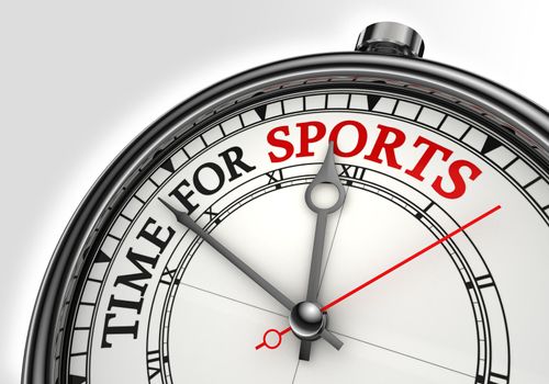 time for sports concept clock closeup on white background with red and black words