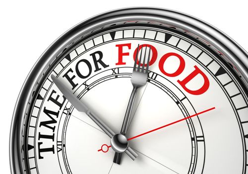 time for food concept clock closeup on white background with red and black words