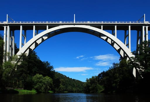 concrete arched bridge over the river