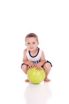 Cute little boy with a ball