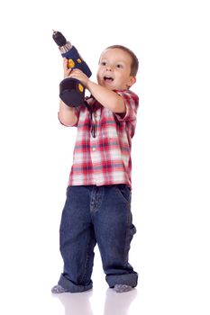 Cute little boy with a drill