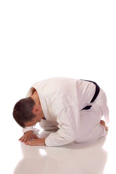 Man in karate-gi in the seiza position