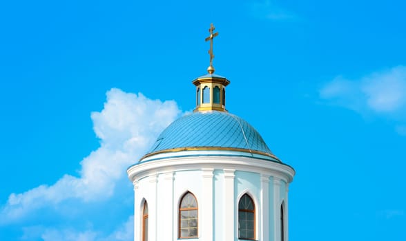 Little white church  on blue sky