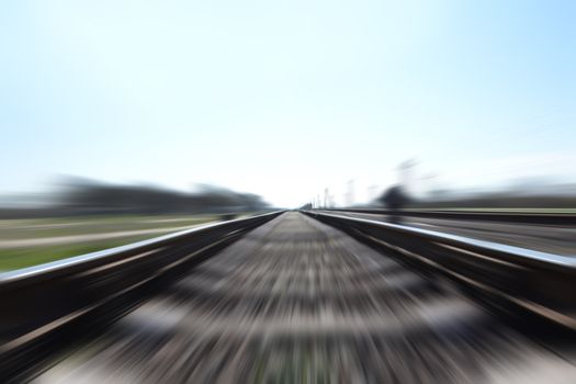 Photo of a Fast train in motion and blue sky