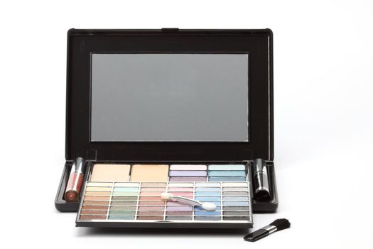 Multi colored make-up palette on white background 