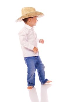 Little boy with a cowboy hat dancing