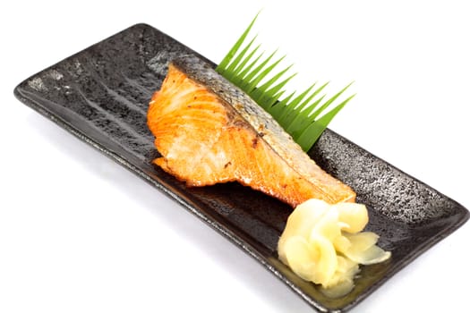 Japanese food style , Salmon  fish grilled the plate on white background