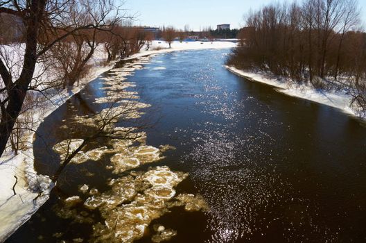 Winter river.Chunks of ice floating on the river in winter