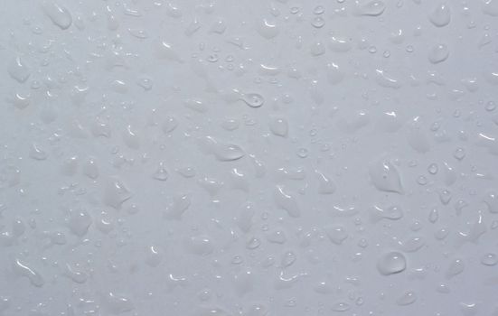 Rain drops on the window flow